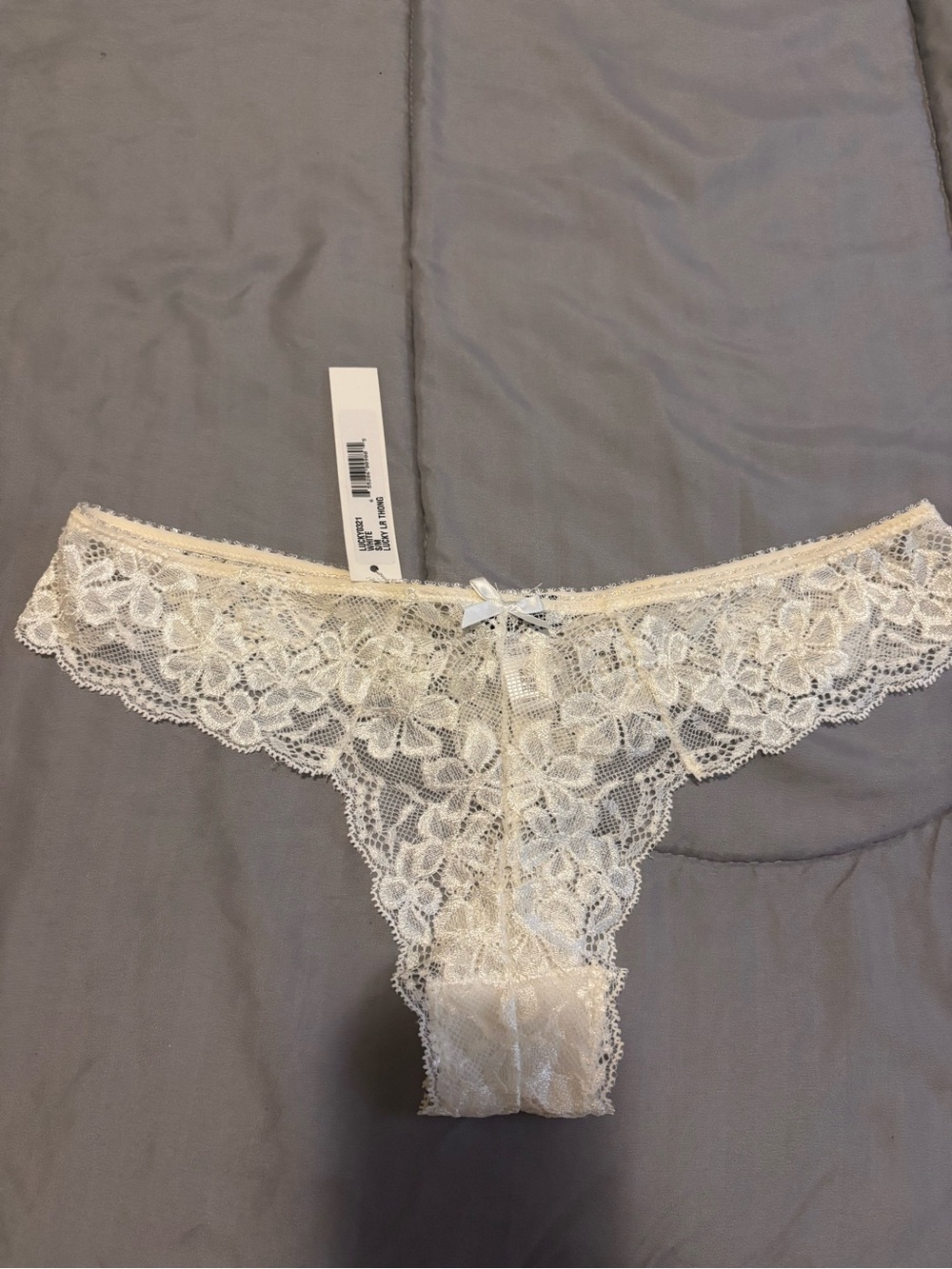 NWT Cosabella off white lace thongs size S/M
